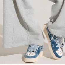 Load image into Gallery viewer, Callie Lives Miz Blue &amp; White Studded Cutout Denim Sneaker
