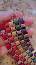 Laden und Abspielen von Videos im Galerie-Viewer, Wholesale Miz Rainbow Ribbon Weave Gold Tone Bulky Bracelet 2 Pack
